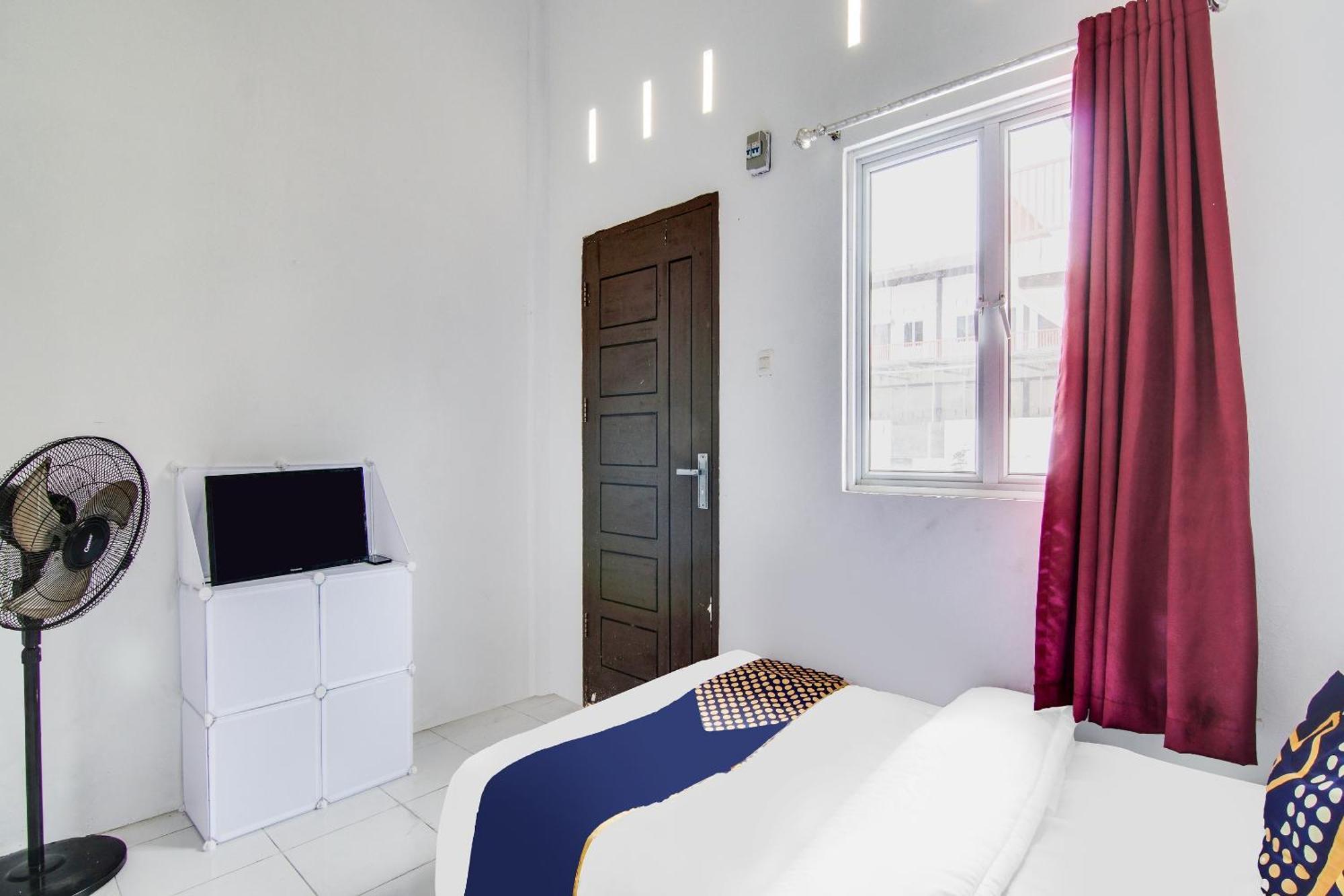 Spot On 91858 Raja Homestay Syariah Pekanbaru Exterior photo